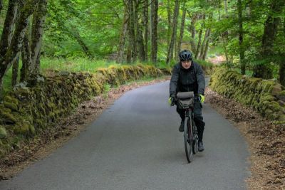 Bill McNeill Cycling on the  tour with redspokes
